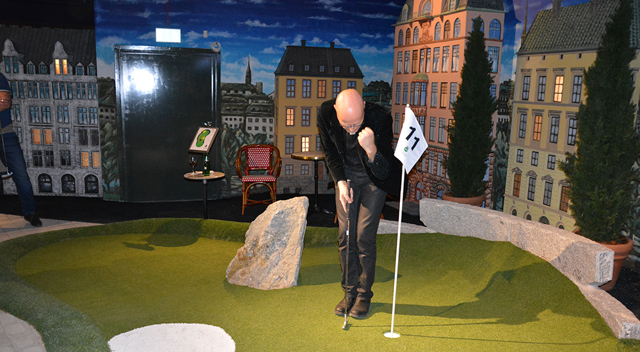 Man playing Adventure Golf