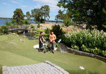 Men standing at fairway